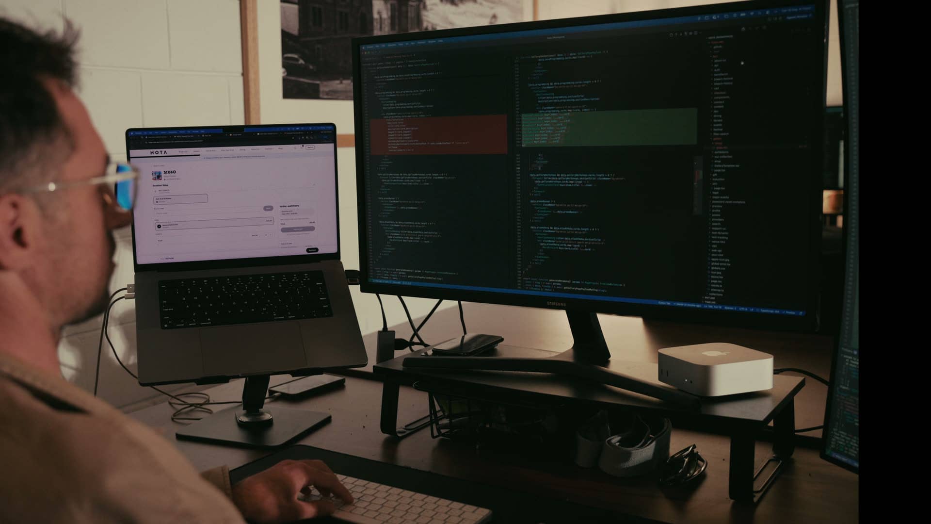 Kale, a Spritely developer, writing code at his desk