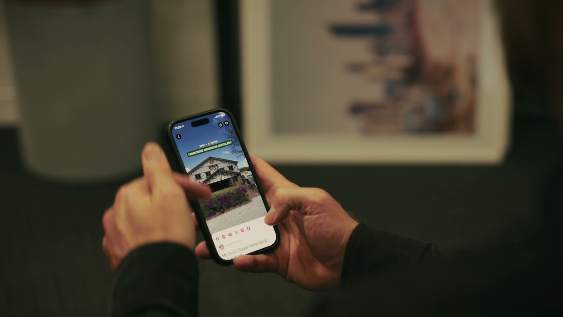 Scott MacKenzie, Director at Spritely, reviewing a product on iPhone